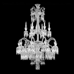 Magnificent 24-light tiered crystal chandelier with cascading pendants in a luxury grand hall.