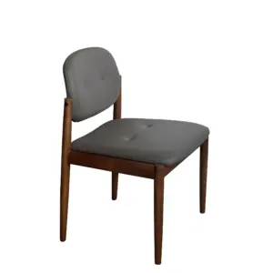 Side view and front view of a solid ash wood dining chair with grey leatherette padding and walnut/black oak frame.