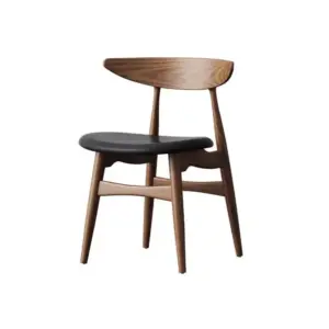 Side view of a walnut finished rubberwood chair with black leatherette seat and wide curved backrest.