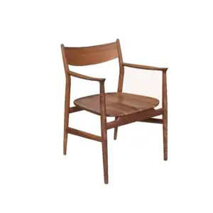 Mid-century modern solid black walnut armchair with sculptural frame and natural finish.