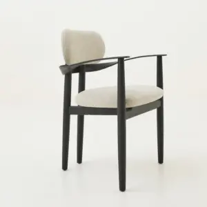 Mid-century solid ash wood armchair in black oak and walnut finishes with textured fabric seat.