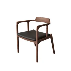 Mid-century solid ash wood armchair in walnut and black oak finishes with a black leather seat.