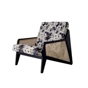 Mid-century modern solid rubberwood lounge chair with Indonesian natural rattan side panels and patterned fabric seat in a black finish.