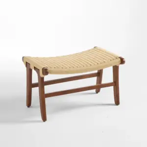 Mid-century modern solid rubberwood bench with hand-woven kraft paper cord seat and V-shaped legs in walnut finish.
