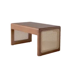 Mid-century modern solid rubberwood bench with hand-woven Indonesian rattan seat and V-shaped legs in walnut finish.