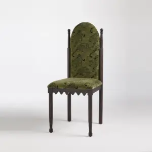 Perspective view of a Black Oak Ash Wood Dining Chair with emerald green leopard print velvet upholstery and high backrest.