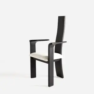 Front-view of a luxury high-back ash wood armchair in black oak finish with vertical spindles and curved armrests.