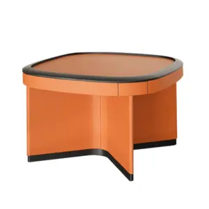 Luxury automatic mahjong table in orange saddle leather with velvet top and matching chairs.