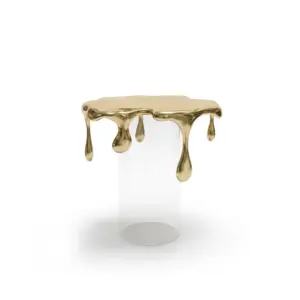 RST Luxury side table featuring a gold molten "dripping" metal top and a clear cylindrical glass base.