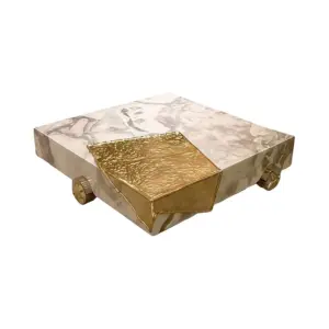 RST Luxury solid marble cubic coffee table with a gold molten metal corner inlay.