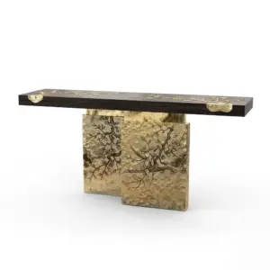 Luxury modern sculptural metal entryway console table with gold and silver ribbon base for hotel lobby.