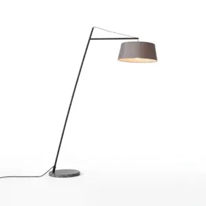 Luxury cantilever floor lamp with a grey fabric drum shade and circular black marble base, customizable for luxury hotel suites.