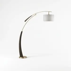 Nordic luxury arched arc floor lamp with black gold white tricolor fabric shade and gold iron stem for hotel suites.