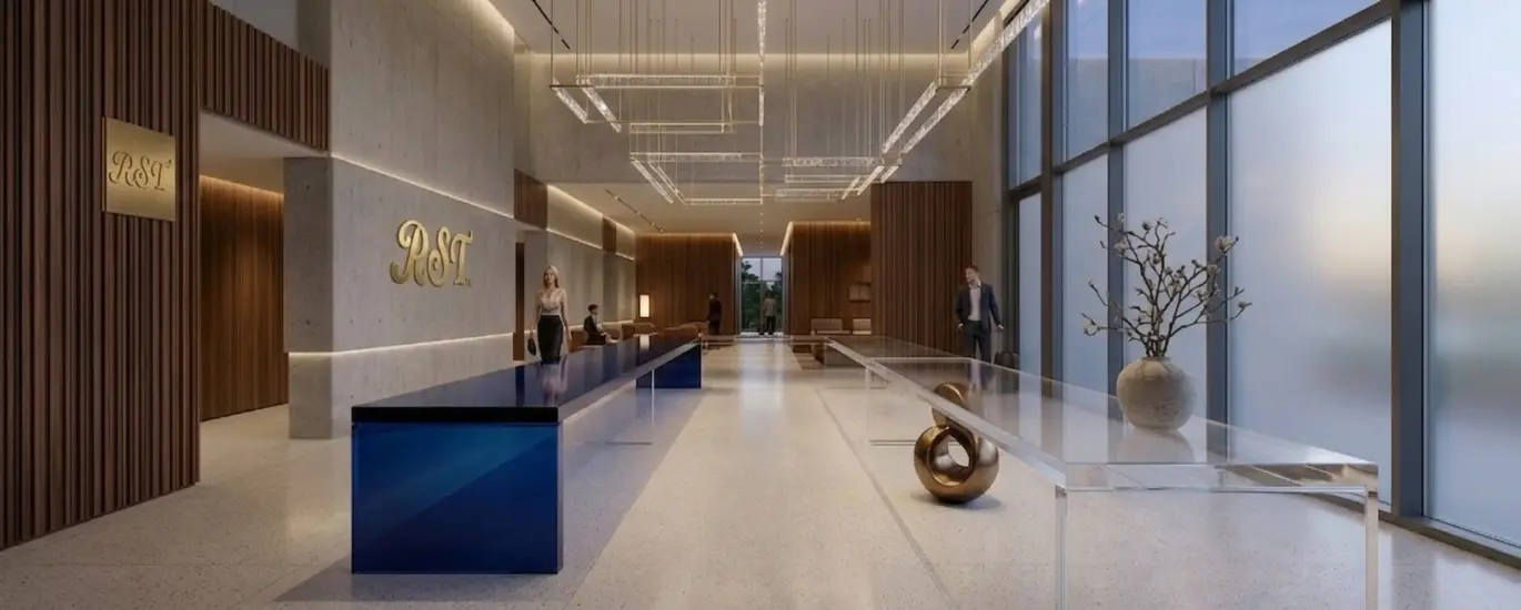 A luxury hotel lobby featuring a long RST Luxury Gradient Acrylic Console Table with a deep blue to clear transition, set against modern wood and concrete architectural elements.