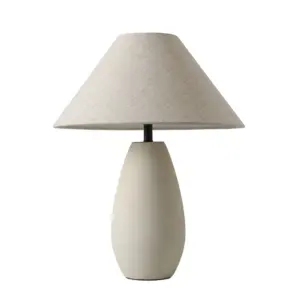 Nordic matte cream droplet ceramic table lamp with conical linen shade for luxury hospitality projects