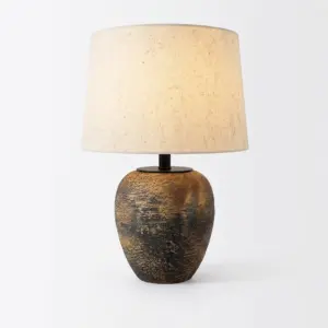Volcanic rock texture ceramic table lamp with deep brown weathered finish and drum fabric shade for luxury hotels.
