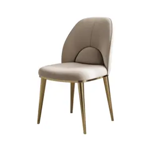 Luxury beige top grain leather dining chair with gold plated stainless steel legs.