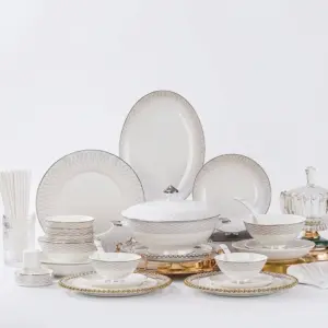 Luxury Customizable Bone China Tableware Set with silver rim and embossed pattern for hotels.