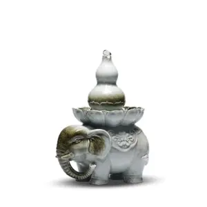 Artisanal Abstract Zen Ceramic Water Fountain with rotating LED crystal ball and tiered ceramic waterfall design.