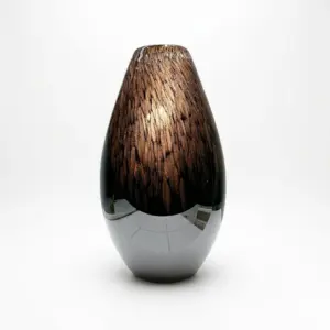 Handcrafted obsidian black Liuli glass vase with a sleek tapered silhouette and mirror-like polished finish.