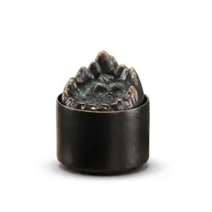 Artisanal Crown Zen Ceramic Water Fountain in white, black, and blue finishes with serrated crown-edge water cascade.