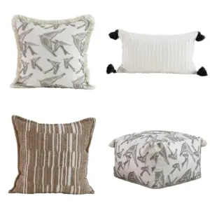 Customizable Geometric Throw Pillow and floor pouf collection featuring modern tribal patterns in neutral and grey tones.