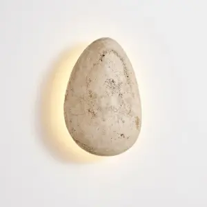 Customizable luxury rectangular wall sconce made of yellow travertine stone with warm LED light for hotel corridors.