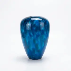 Handcrafted Cobalt Blue Liuli glass vase with organic internal patterns.