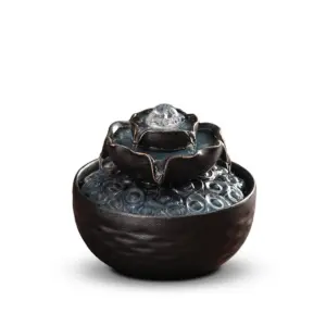 Artisanal Prosperity Lotus Zen Ceramic Water Fountain with tiered lotus petal design and bubbling water.