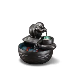 Artisanal Elephant Auspicious Zen Ceramic Water Fountain with rotating LED crystal ball and water flowing from the elephant's trunk.