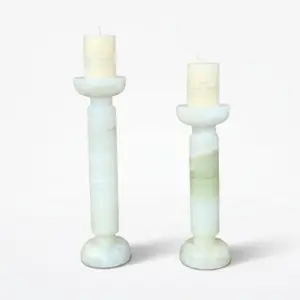 Luxury custom marble candle holder in White Jade with unique natural veining for high-end hotel decoration.
