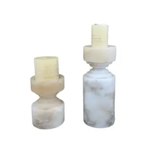 Luxury custom marble candle holder in White Jade with unique natural veining for high-end hotel decoration.