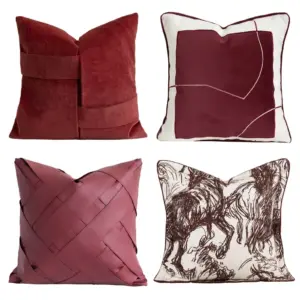Artisan Crimson Textured Throw Pillow collection featuring geometric embossing, fringe edges, and luxury wool-blend textures in deep red.