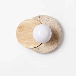 Customizable luxury wall sconce with spherical alabaster stone shade and black walnut solid wood arm.