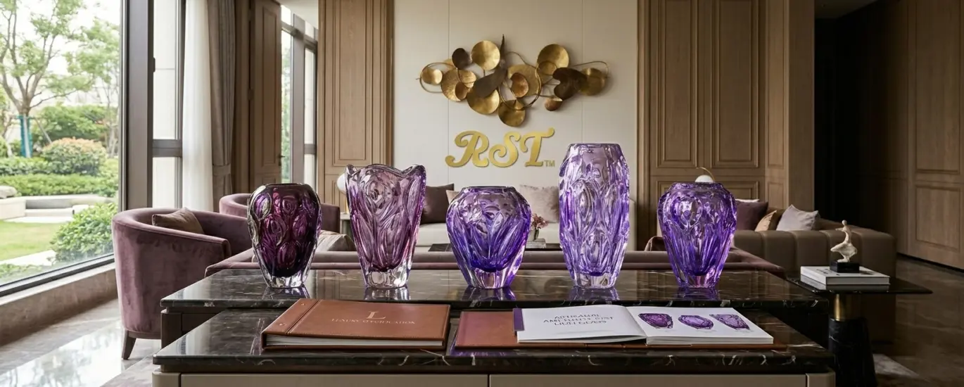 Handcrafted amethyst Liuli glass vases displayed in a luxury hotel lounge, featuring intricate purple crystal textures for high-end interior design projects.