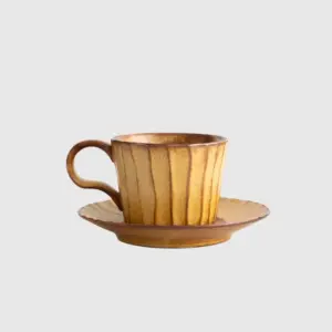 Luxury customizable brown ceramic coffee cup and saucer set with vertical fluted texture and gradient glaze for premium hospitality dinnerware and high-end home decor by RST.