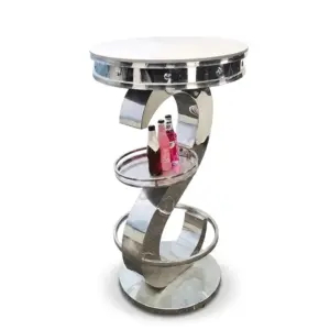 Luxury polished silver stainless steel commercial bar table with integrated shelving and modern professional finish.